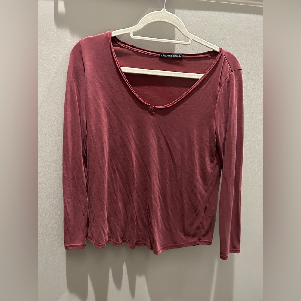 Pink long sleeve. Fits like size medium